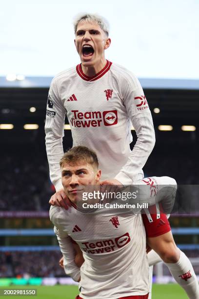 Rasmus Hojlund of Manchester United celebrates with teammate Alejandro Garnacho after scoring his team's first goal during the Premier League match...