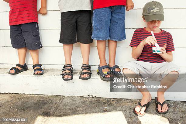 Boys Wearing Sandals Photos and Premium High Res Pictures - Getty Images
