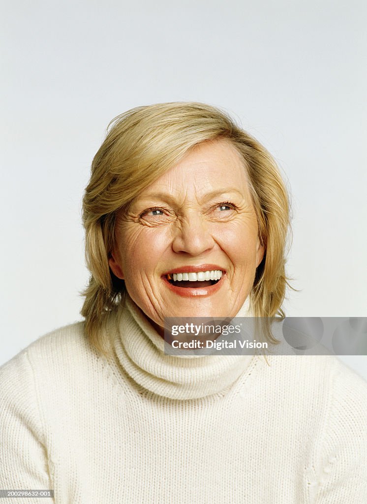 Senior woman smiling, close-up