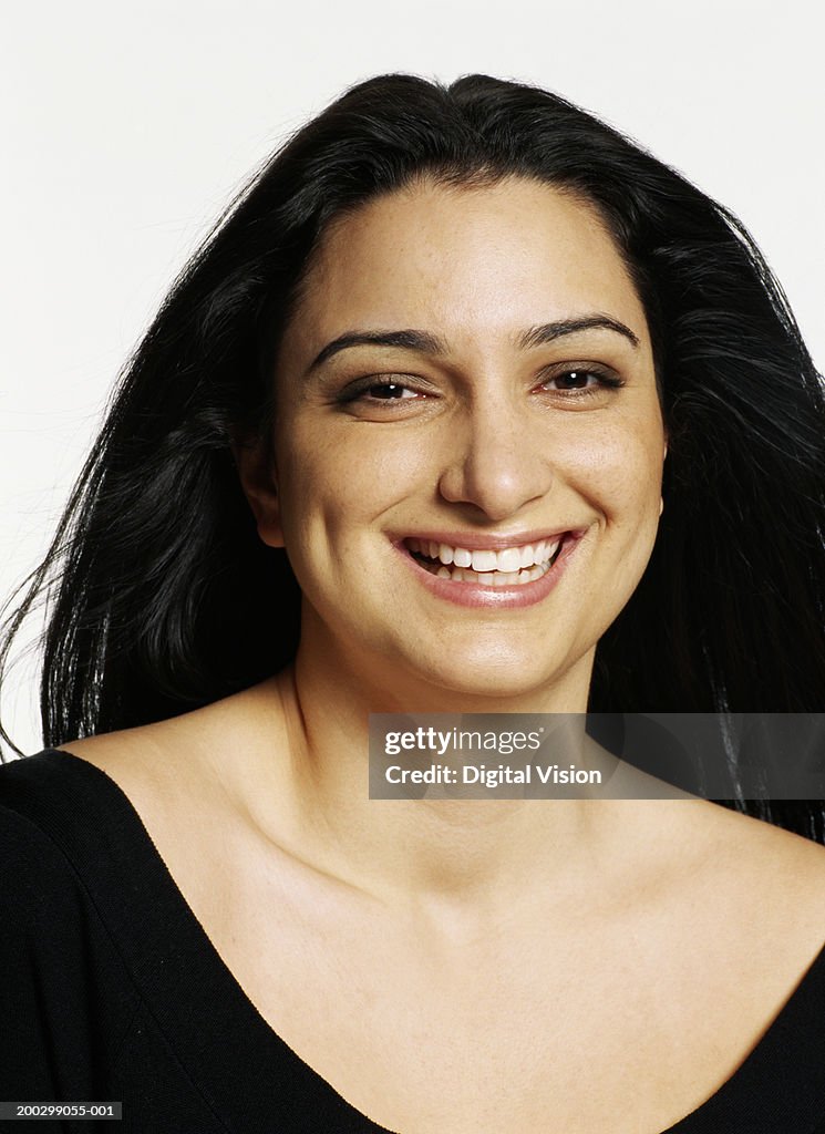 Young woman smiling, portrait