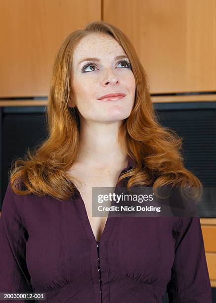 woman smiling, close-up - purple shirt stock pictures, royalty-free photos & images