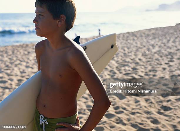 Asako Long Beach　ZAIGLE BOY Boy With Surfboard Standing At Beach Looking Away High-Res Stock