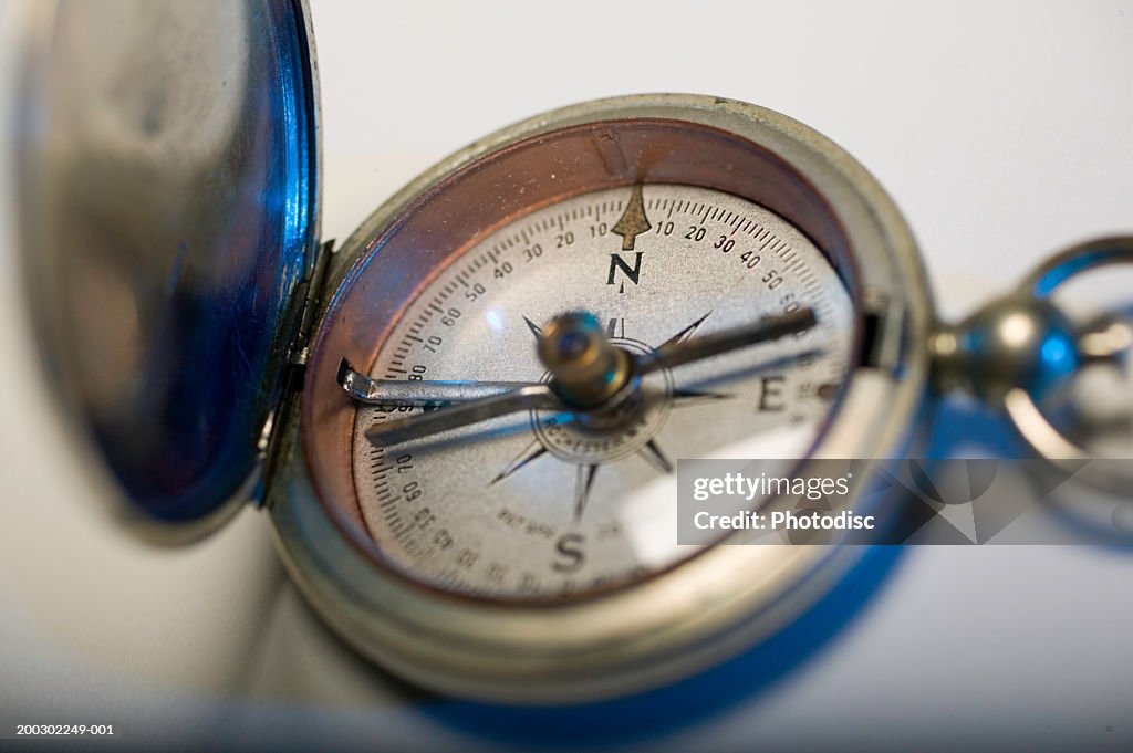 Silver pocket compass, close-up