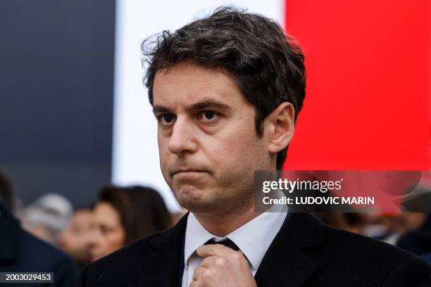 France's Prime Minister Gabriel Attal attends a national tribute ceremony in honour of late French justice minister Robert Badinter, outside the...