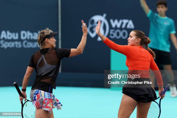 Sofia Kenin of the United States and Bethanie Mattek-Sands of the United States celebrate scoring a point against Linda Noskova of Czech Republic and...