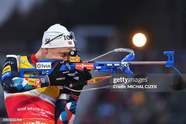 Norway's Johannes Thingnes Bo warms up at the shooting range prior to the men's 20 km individual event of the IBU Biathlon World Championships in...