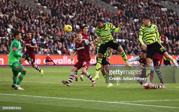 Gabriel of Arsenal scores his team's third goal during the Premier League match between West Ham United and Arsenal FC at London Stadium on February...