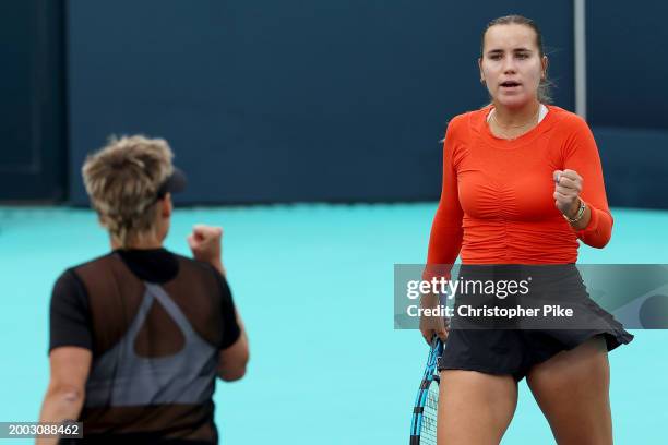 Sofia Kenin of the United States and Bethanie Mattek-Sands of the United States celebrate scoring a point against Linda Noskova of Czech Republic and...