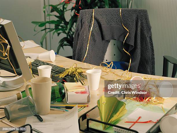 office desk littered with party remnants - after party mess stock pictures, royalty-free photos & images