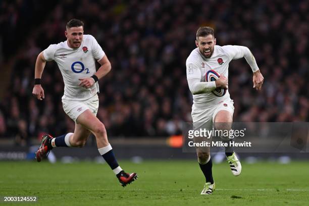 Elliott Daly of England in action with team mate Freddie Steward in support during the Guinness Six Nations 2024 match between England and Wales at...