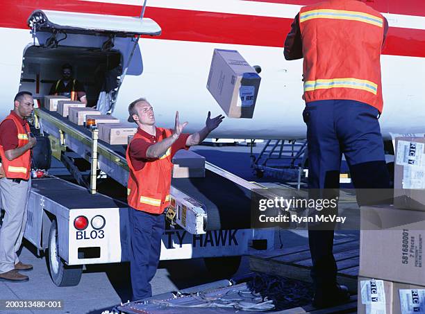 People Loading Luggage Airplane Baggage Loading Photos and Premium High Res Pictures - Getty ...