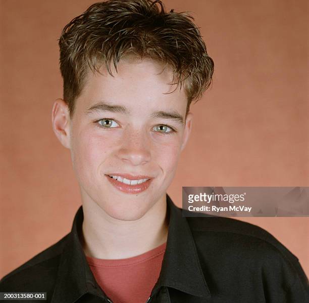 Boy With Brown Hair Smiling Portrait High-Res Stock Photo - Getty Images