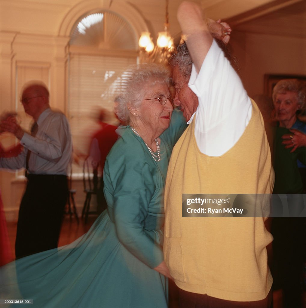 Senior couple dancing in ballroom