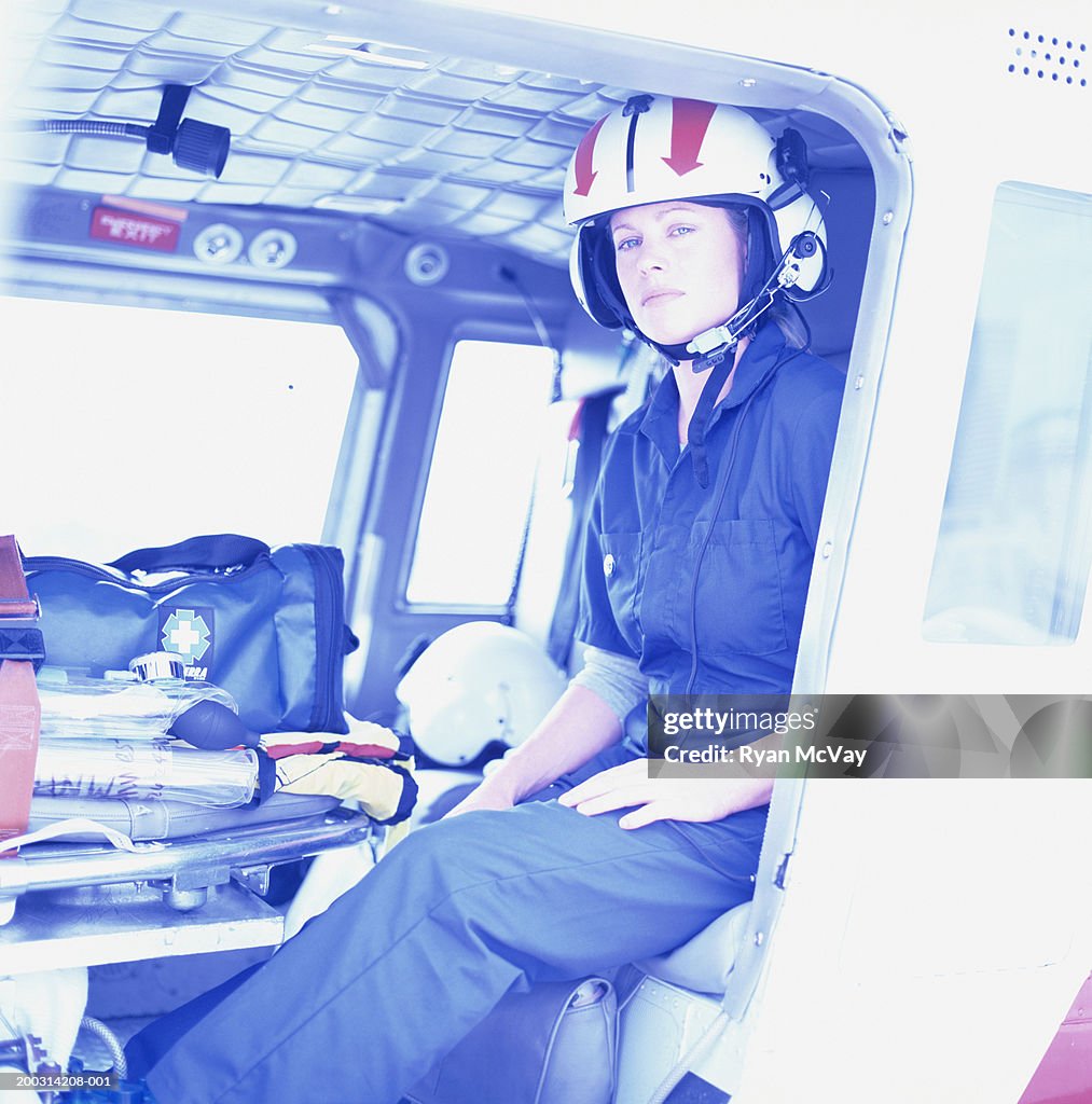 Emergency Rescue Worker Sitting In Helicopter Portrait High-Res Stock ...