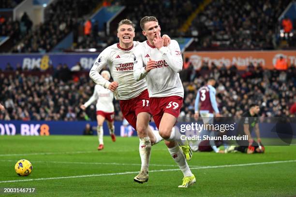 Scott McTominay of Manchester United celebrates with teammate Rasmus Hojlund after scoring his team's second goal during the Premier League match...