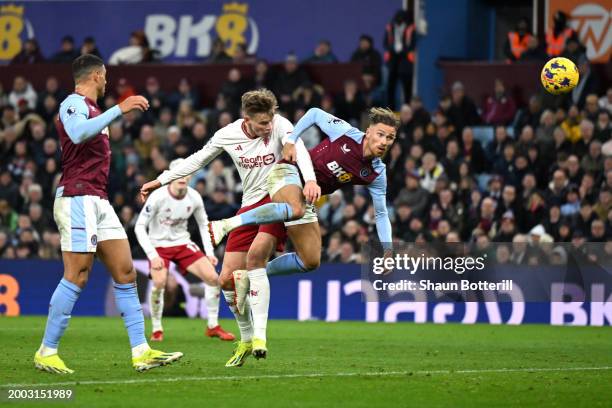 Scott McTominay of Manchester United scores his team's second goal from a header under pressure from Matty Cash of Aston Villa during the Premier...
