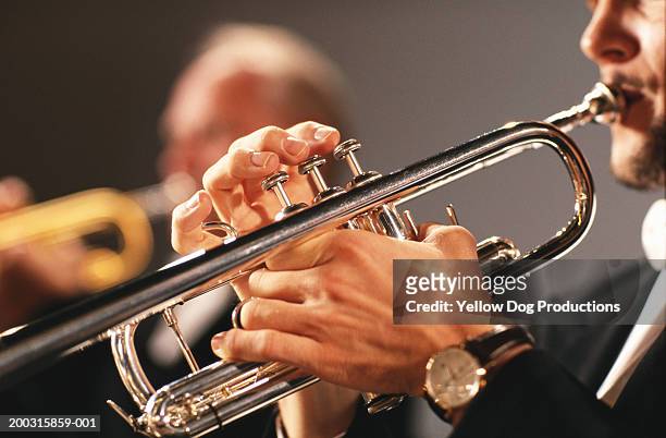 man playing trumpet, side view, close-up - trumpet 個照片及圖片檔