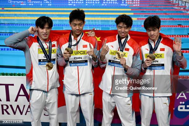 Gold Medalists, Zhanle Pan, Xinjie Ji, Zhanshuo Zhang and Haoyu Wang of Team People's Republic of China pose with their medals during the Medal...
