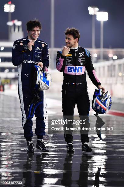 Zak O'Sullivan of Great Britain and ART Grand Prix and Victor Martins of France and ART Grand Prix talk in the Pitlane during day one of Formula 2...