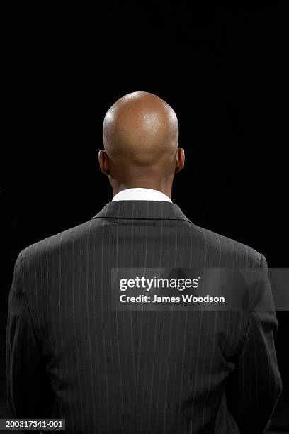 businessman, rear view - haaruitval stockfoto's en -beelden