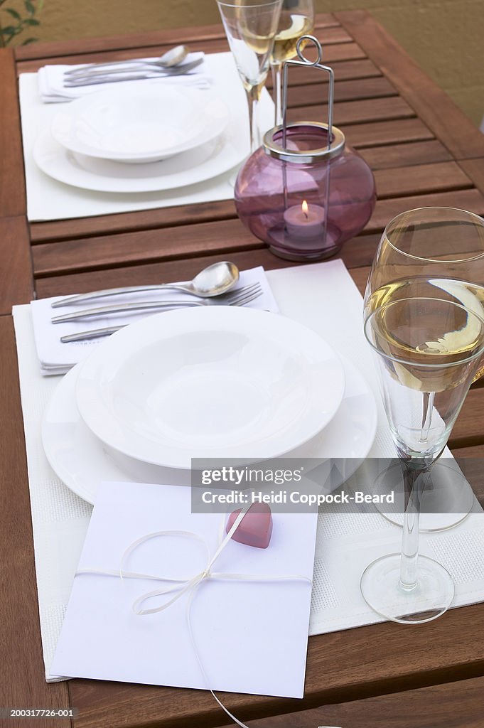 Card with heart on place setting, elevated view