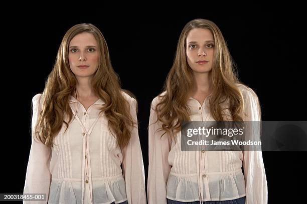 young female twins side by side, portrait - finger waves imagens e fotografias de stock