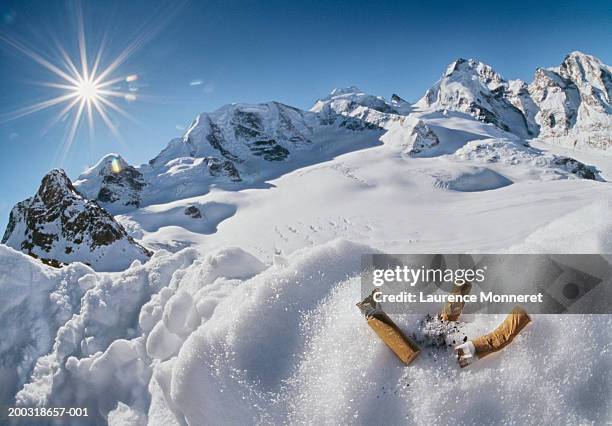 cigarette butts in mountain snow - stubs stock pictures, royalty-free photos & images