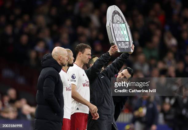 Unai Emery, Manager of Aston Villa, looks on as Sofyan Amrabat and Jonny Evans of Manchester United are substituted on during the Premier League...