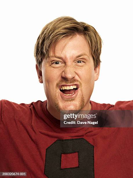 man in t-shirt cheering, portrait,  close-up - cu fan stockfoto's en -beelden