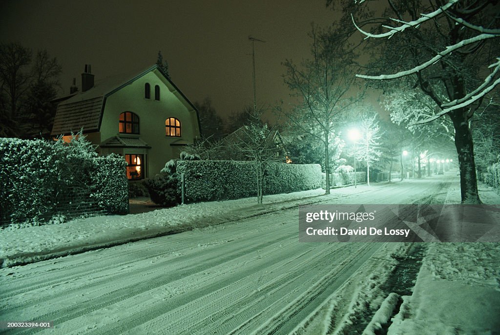 Snow covered street, night