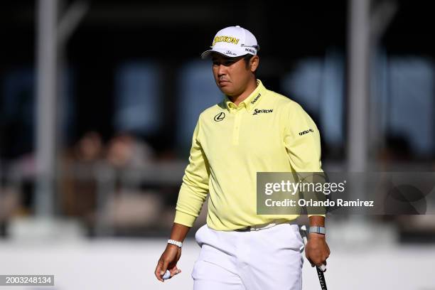 Hideki Matsuyama of Japan looks on from the 17th green during the continuation of the third round of the WM Phoenix Open at TPC Scottsdale on...