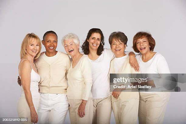 group of mature and senior women, smiling, portrait - senior woman studio ストックフォトと画像