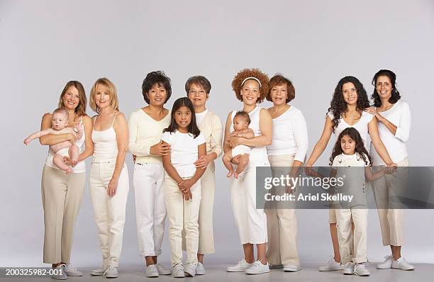 group of multi-generational family, smiling, portrait - white trousers fotografías e imágenes de stock