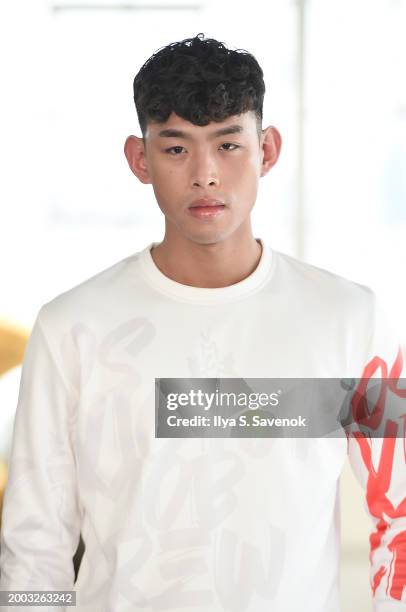 Model walks the runway wearing OS VMC with Suave Suede bags during Flying Solo NYFW February 2024 at Canoe Studios on February 11, 2024 in New York...