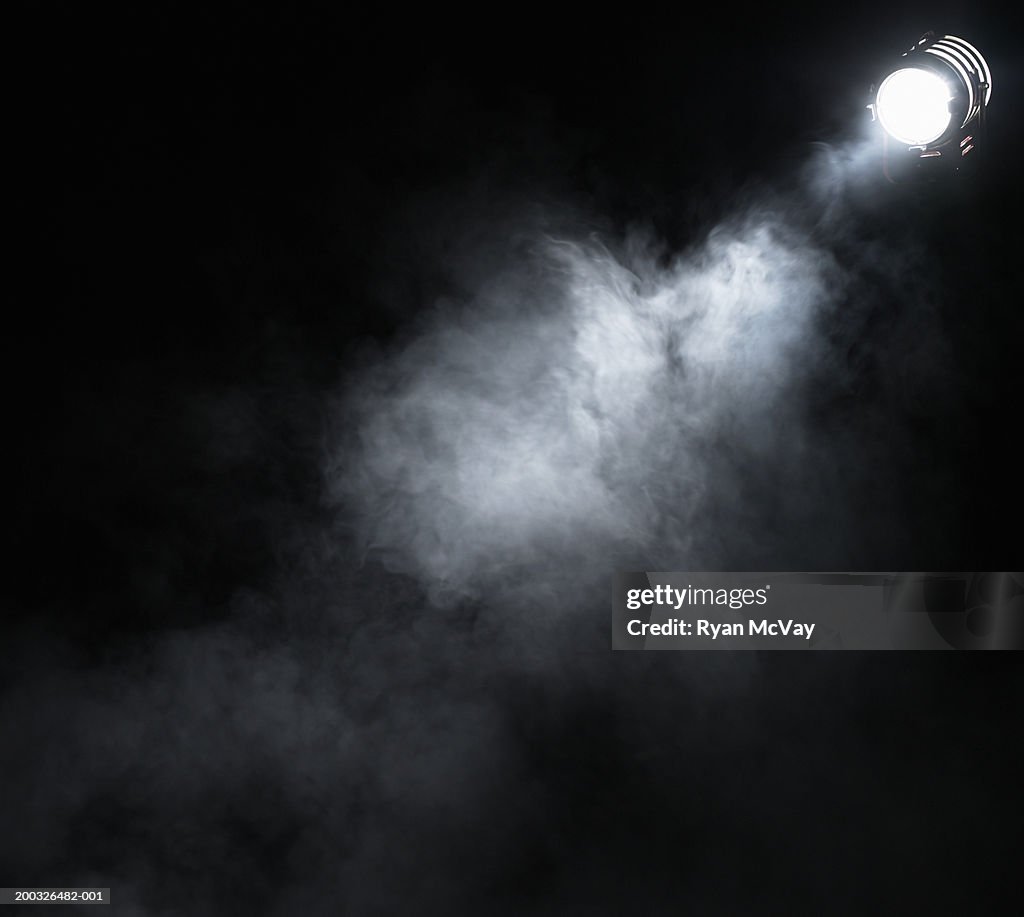 Smoke beneath spotlight