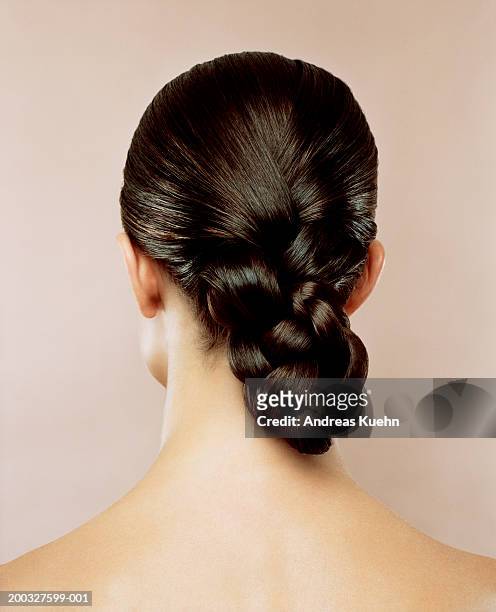 woman with hair braided, rear view - beautiful braid stockfoto's en -beelden