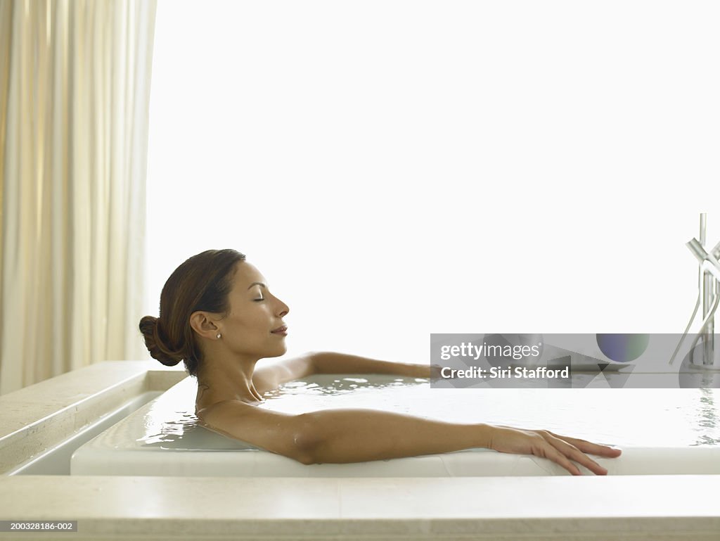 Woman relaxing in bath