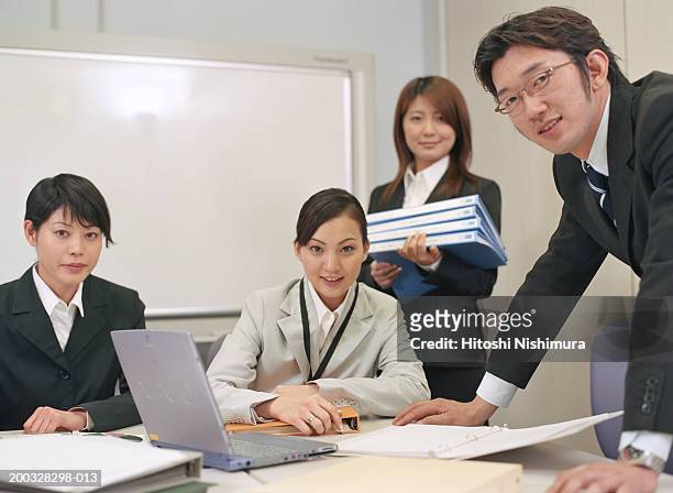 businesspeople at conference table, smiling, portrait - only japanese stock pictures, royalty-free photos & images