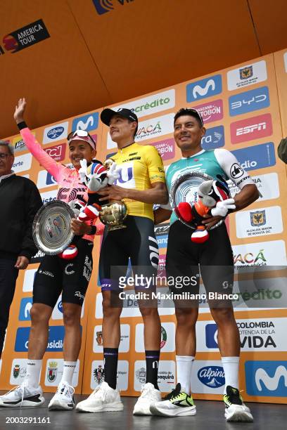 Richard Carapaz of Ecuador and Team EF Education - EasyPost on second place, race winner Rodrigo Contreras of Colombia and Team Nu Colombia - Yellow...