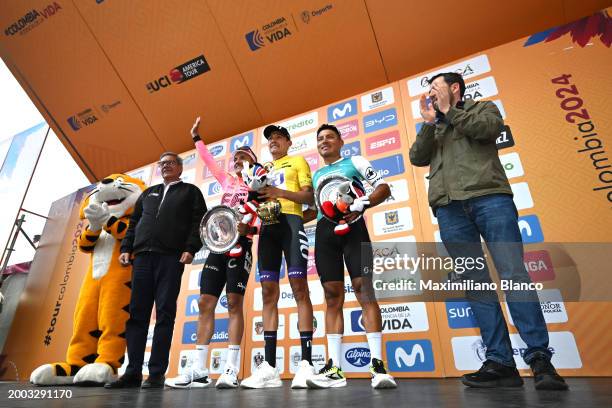 Richard Carapaz of Ecuador and Team EF Education - EasyPost on second place, race winner Rodrigo Contreras of Colombia and Team Nu Colombia - Yellow...