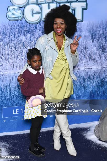 Ange Kouka and her daughter attend the "Chien Et chat" Premiere at Cinema UGC Normandie on February 11, 2024 in Paris, France.