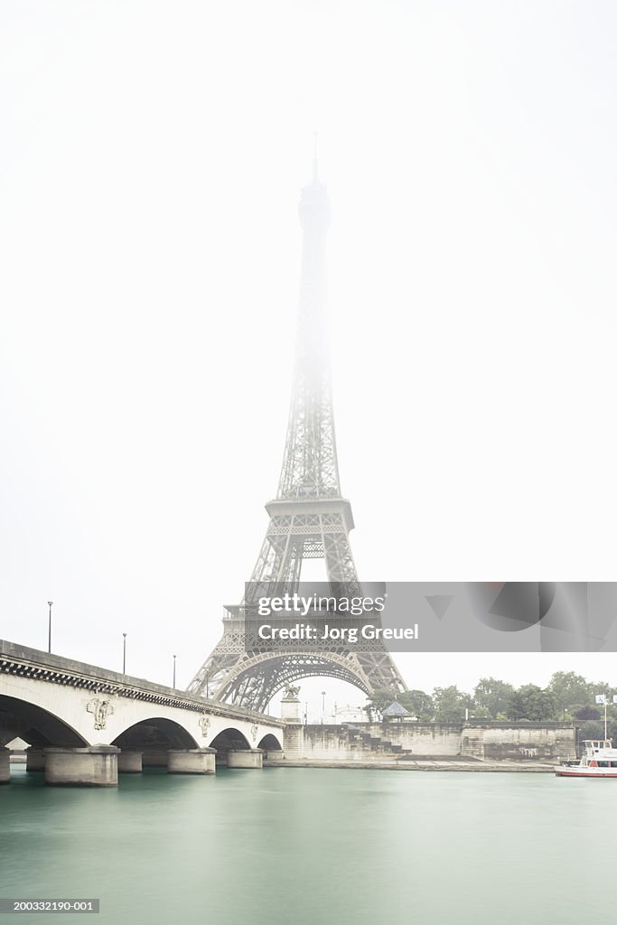 France, Paris, Eiffel Tower and Pont d'lena on River Seine