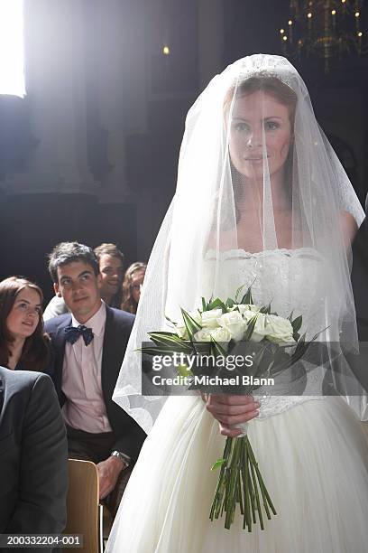 bride walking down aisle, smiling - bridal veil stock pictures, royalty-free photos & images