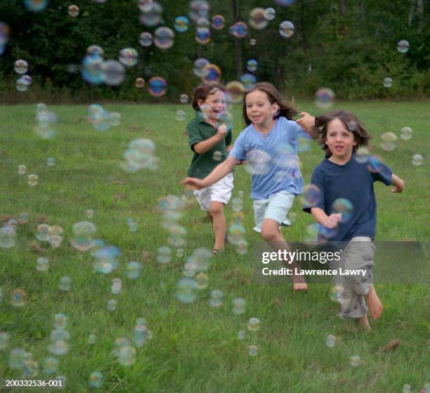 Chasing Casks Kid Chasing Bubbles Photos and Premium High Res Pictures - Getty Images