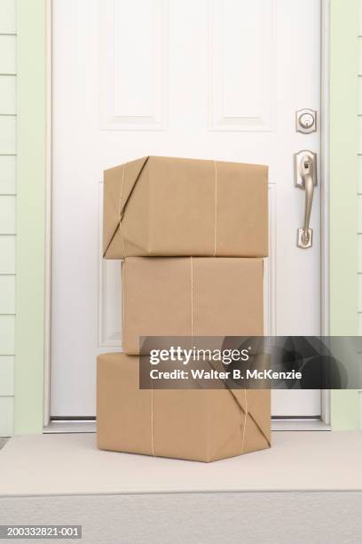 131 Stack Of Packages Front Door Stock Photos, High-Res Pictures, and ...