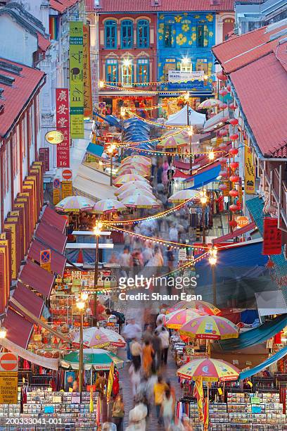 singapore, singapore city, chinatown at night (long exposure) - singapore stock pictures, royalty-free photos & images