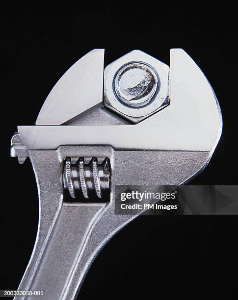 wrench and nut - nut fastener stock pictures, royalty-free photos & images