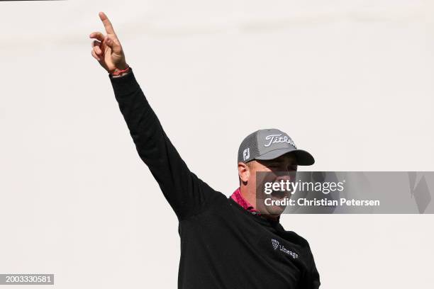 Justin Thomas of the United States reacts on the 17th tee during the continuation of the third round of the WM Phoenix Open at TPC Scottsdale on...