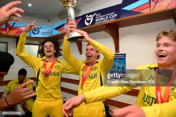 Sam Konstas and Harry Dixon of Australia pose for a photograph with the ICC U19 Men's Cricket World Cup trophy after the ICC U19 Men's Cricket World...