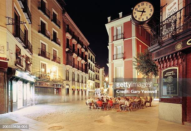 spain, madrid, calle de  postas, people sitting outside restaurant - madrid plaza stock pictures, royalty-free photos & images
